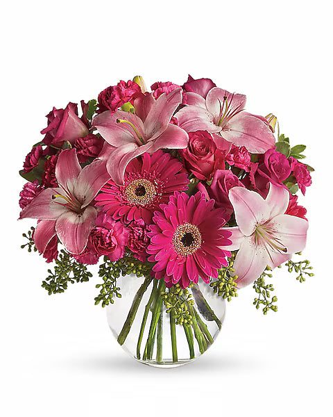 Bright bouquet on an outdoor dining table.