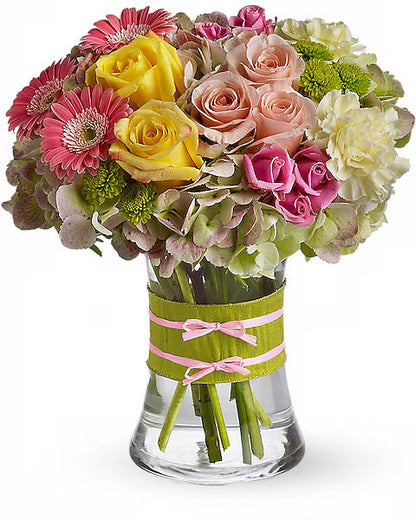 Bouquet of Fresh flowers  in a clear vase 