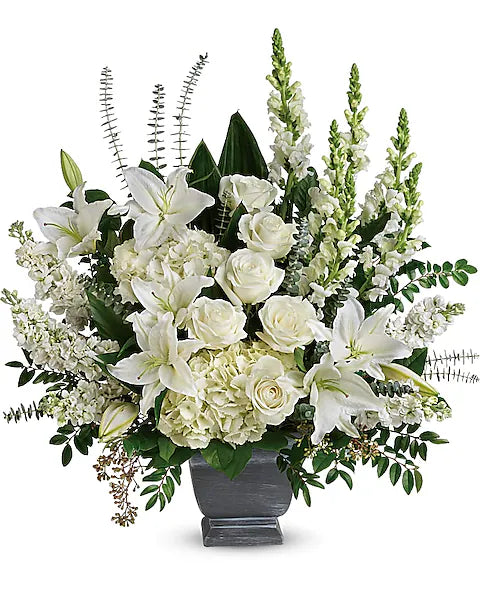 Bouquet of white flowers gray vase 