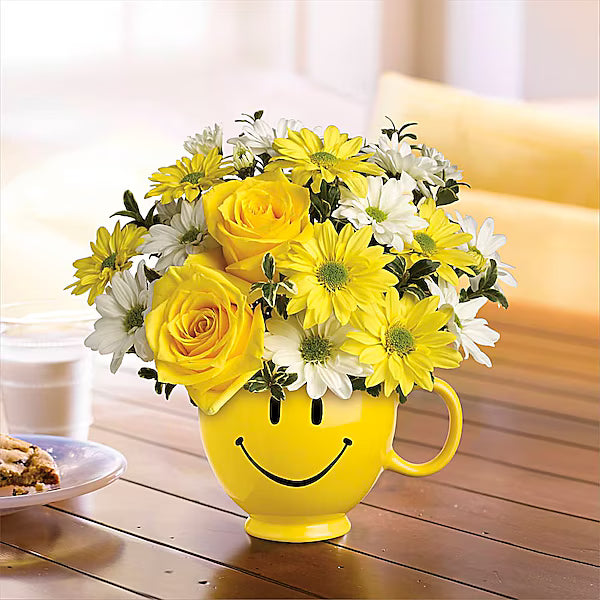Yellow smiley cup with blooms
